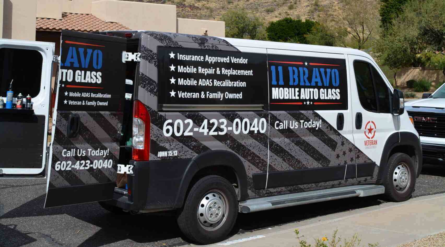 Mobile auto glass service van in a residential area in Surprise, AZ